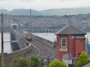 Tay rail bridge with train from south side at Wormit